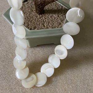 Antique mop disk long necklace